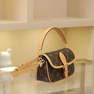 Alternative view of This Diane mini handbag features a Monogram canvas body with vintage elements like leather corners and a traditional clasp. A miniature version of the Diana model, it offers ample space for your phone and other essentials. It showcases the most distinctive details of the original design, such as the circular flap and belt closure. This versatile piece, perfect for day or night, features adjustable wings and a waist strap, both of which are removable.19 x 10.5 x 6 cm (L x H x W)